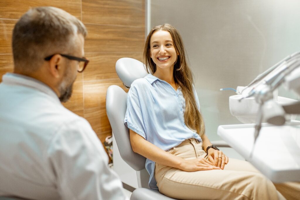 patient at dentist preparing to replace metal fillings